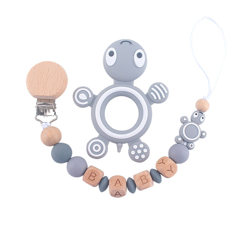 Bebé haya juguete mordedor tortuga chupete de silicona cadena AliExpress Amazon Venta caliente mordedor traje