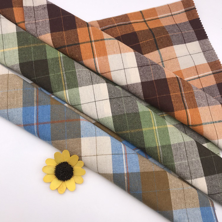 厂家直销 新品21支涤棉磨毛色织格 人字纹衬衫家居服口袋面料现货