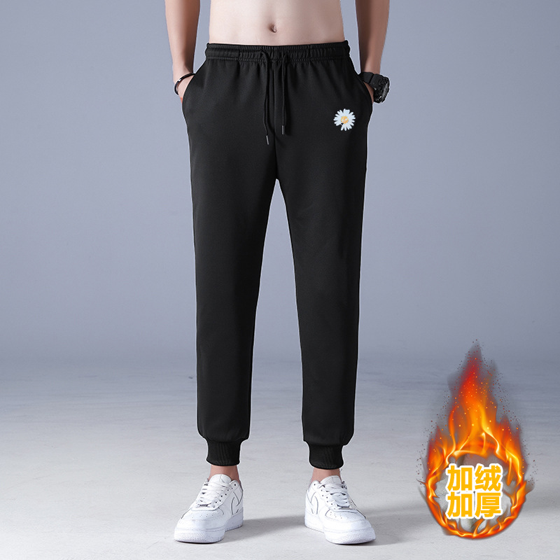 2021 nuevos hombres de invierno forrados de lana engrosada pantalones de algodón de lana de cordero pantalones casuales pantalones de chándal de moda coreana al por mayor