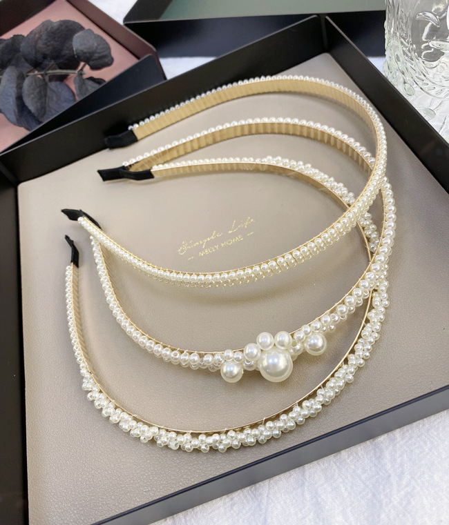 Korean Fashion Sweet Twist  Braid Pearl Hair Hoop Female Korean Ladies Hair Accessories Wave Bride Fine Edge Headband Wholesale Nihaojewelry display picture 1