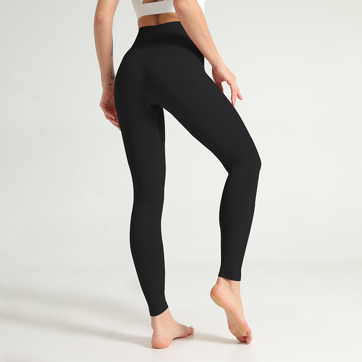 Pantalones de yoga sin costuras ajustados de cintura alta y alta elasticidad para levantamiento de cadera NSNS86449
