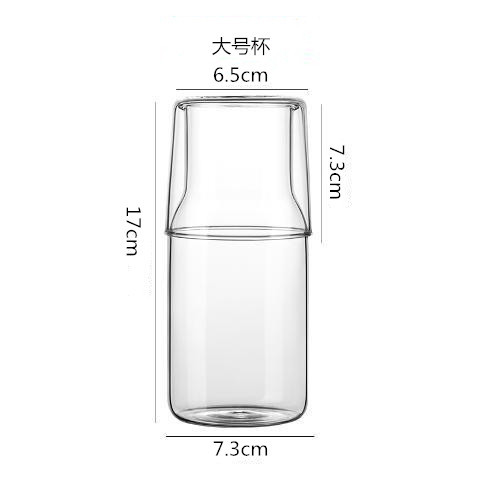 Una persona que bebe vidrio transparente traje de jugo olla leche desayuno taza una olla dos capacidad image 8