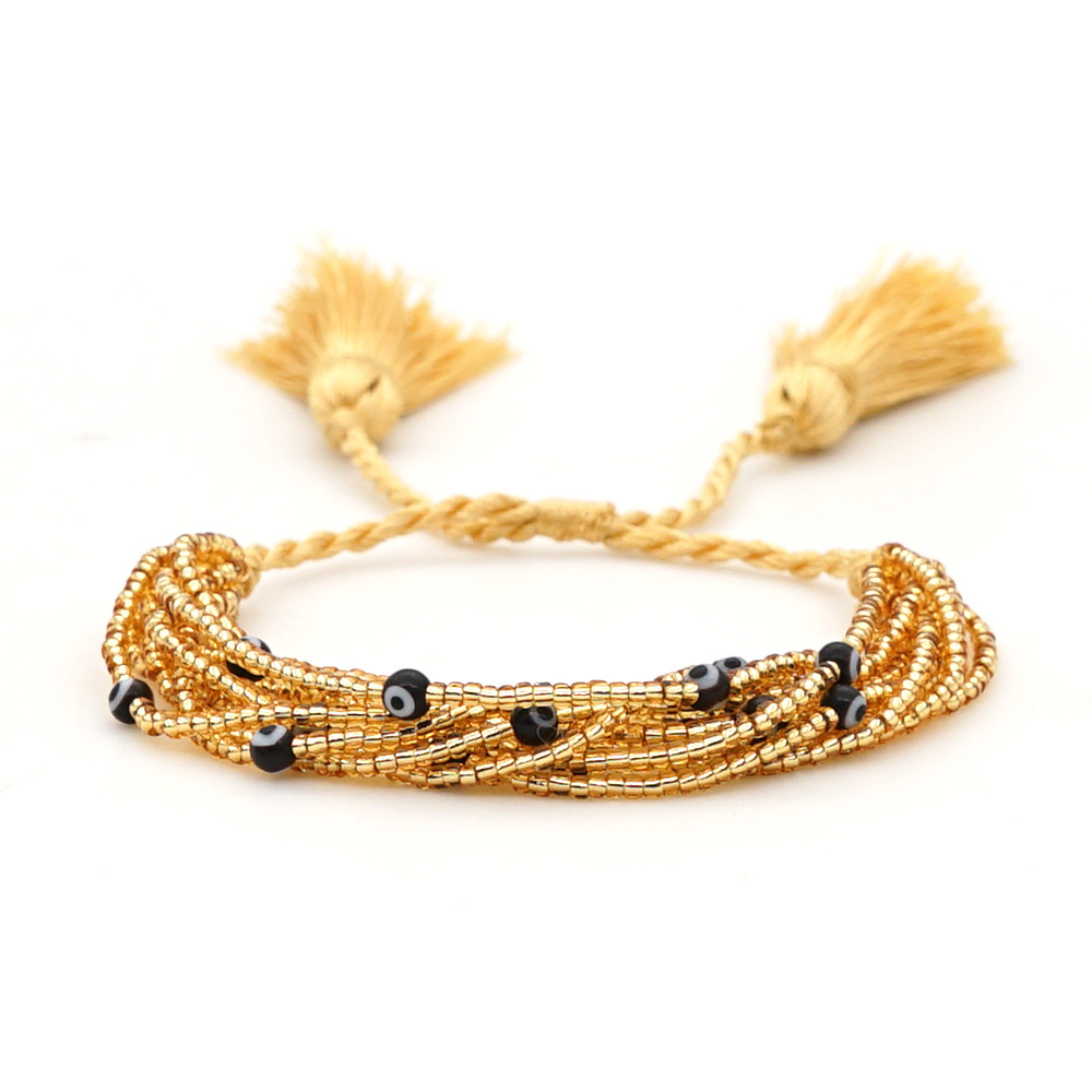 Mode Rétro Sauvage Style Ethnique Gland Perles De Riz Bracelet Tissé À La Main Yeux Multicouche Pour Les Femmes display picture 3