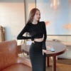 Long sleeved top， high waisted skirt， casual two-piece set