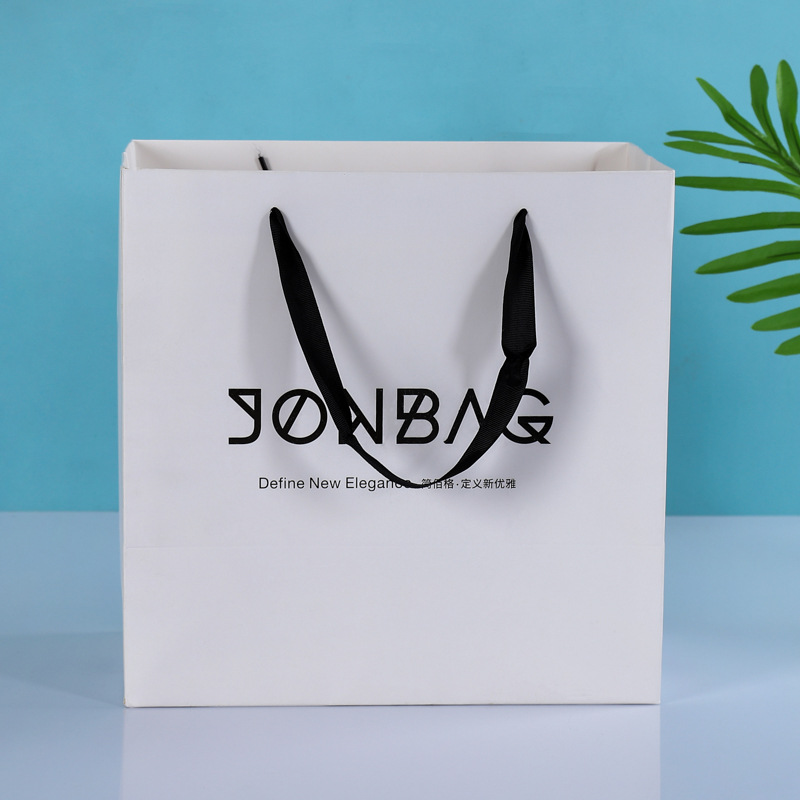 简约服装纸袋定制商场礼品袋外卖购物袋牛皮纸手提袋定制印logo