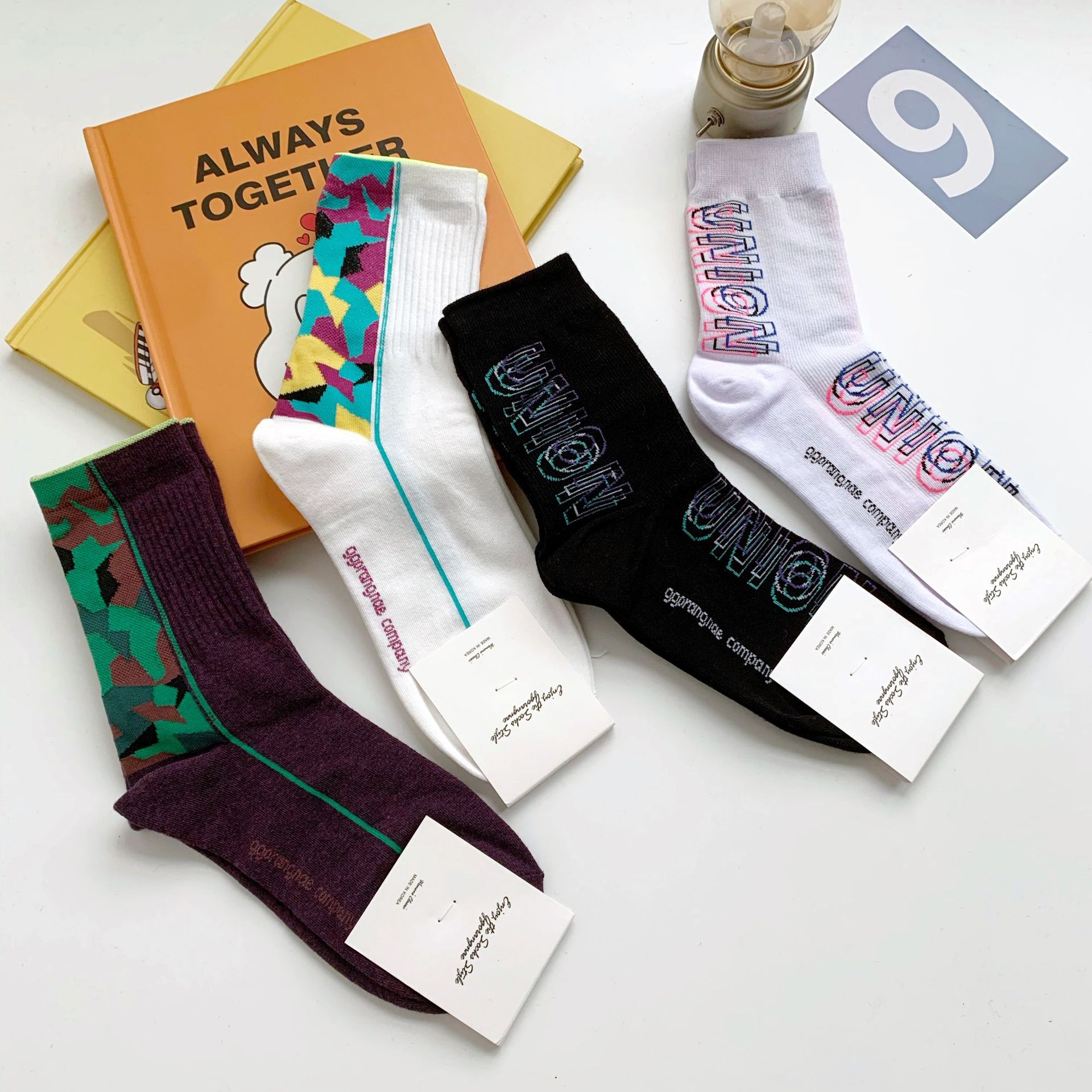 义乌袜子5元一斤批发韩国商标的袜子