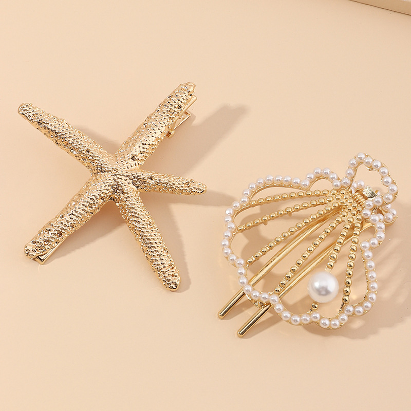 New Beach Hairpin Holiday Golden Starfish Pearl Hollow Small Shell Hairpin Side Clip Wholesale Nihaojewelry display picture 3