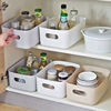 Handheld plastic storage basket, storage system, table kitchen, storage box