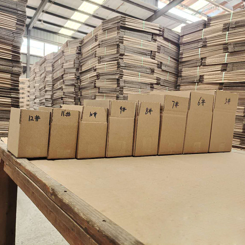 Caja de avión de cartón de comercio electrónico caja de embalaje de cartón de embalaje expreso engrosada caja de papel Kraft corrugado al por mayor
