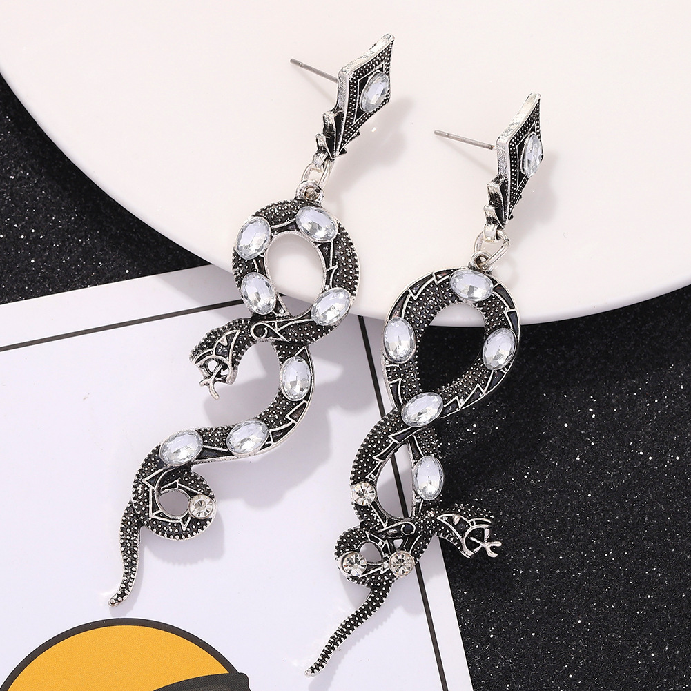 Hot Selling Exaggerated Snake Inlaid Pearl Python Earrings display picture 8