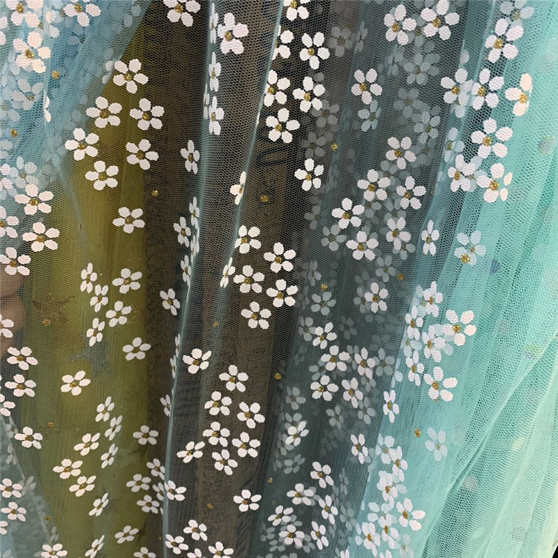 爆款现货 小梅花胶浆烫金印花网眼布  童装礼服舞台演出网纱布料