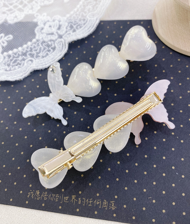 South Korea Butterfly Pearl Rhinestone Side Clip Simple Fashion Love Cute Hairpin Wholesale Nihaojewelry display picture 11