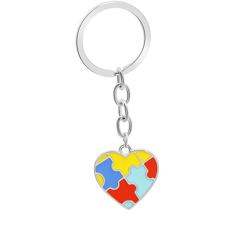 Creative Children's Puzzle Wild Four-color Puzzle Drop Oil Splicing Color Heart-shaped Cross Key Ring Pendant Wholesale Nihaojewelry display picture 2