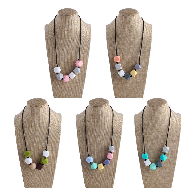 Comercio exterior Amazon collar nuevo bebé molar silicona octogonal mordedor collar masticable colgante mordedor palo