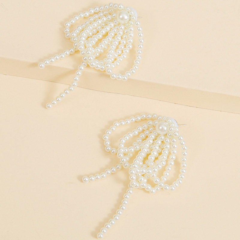 Korean Temperament Hand-woven Pearl Tassel Earrings Personality Long Earrings Jewelry Wholesale Nihaojewelry display picture 5