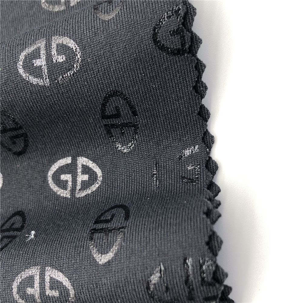 销售锦氨纬编 仿棉烫金 针织布 服装面料