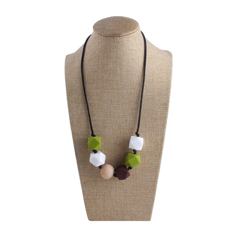 Comercio exterior Amazon collar nuevo bebé molar silicona octogonal mordedor collar masticable colgante mordedor palo