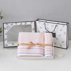 Set of two bath towels and hand towels as corporate gifts with logo, presented in a gift box with a carrying handle