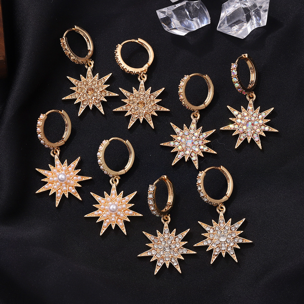 Fashion Six-pointed Star Tassel Inlaid Pearl Earrings display picture 1