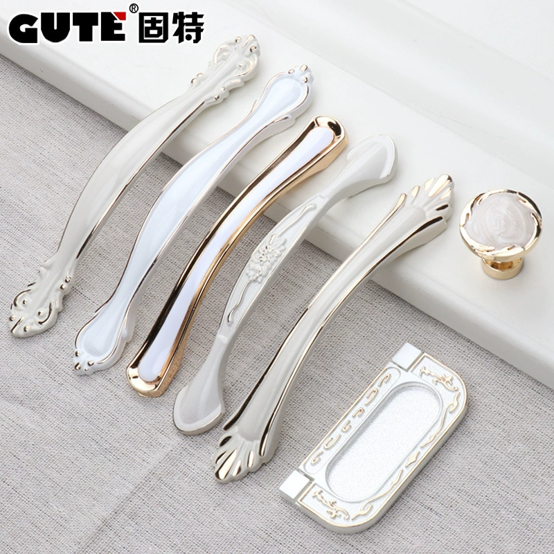 Индийская? Wait: The second is Chinese: Ivory white pull hand modern simple cabinet door drawer pull handwater closet door handle