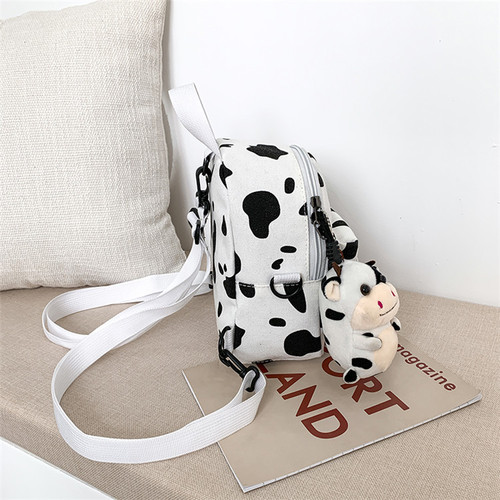 Harajuku style schoolbag female ins super popular cow pattern cute girl canvas bag Korean version soft girl children's backpack bag