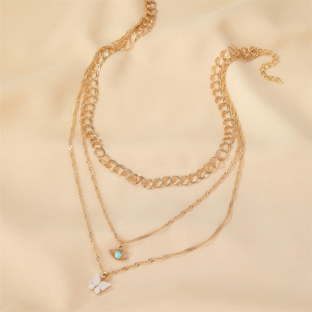 Multi-layer Necklace Retro Metal Thick Chain 3-layer Green Eye Long Necklace Butterfly Sweater Chain Women display picture 6