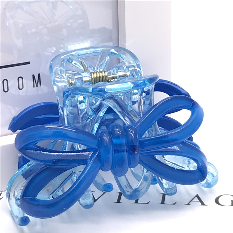 Venta caliente de plástico pintura en aerosol inversa 7cm monstruo garra horquilla pelo agarre clip de dos yuanes tienda de accesorios para el cabello accesorios para la cabeza suministro de accesorios