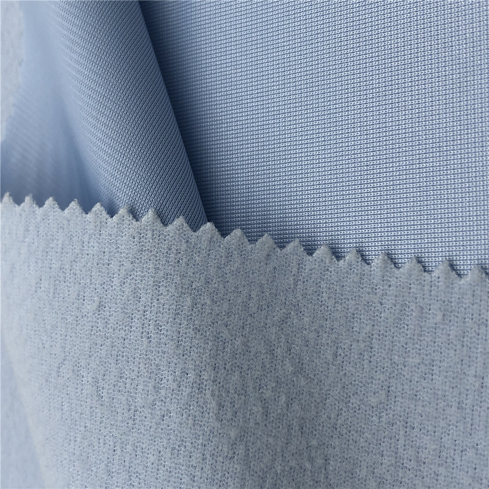 销售金光绒 全涤夹克运动服面料 经编单面绒