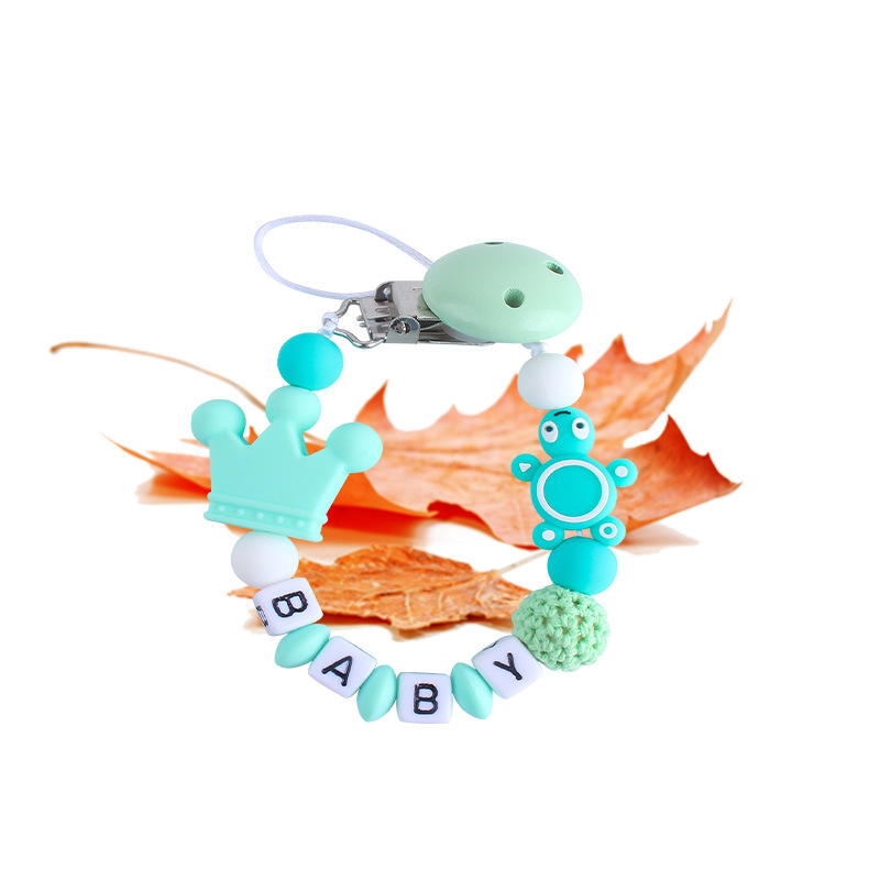 Bebé de plástico carta chupete clip bebé calmante corona de silicona tortuga mordedor chupete cadena anti-gota cadena