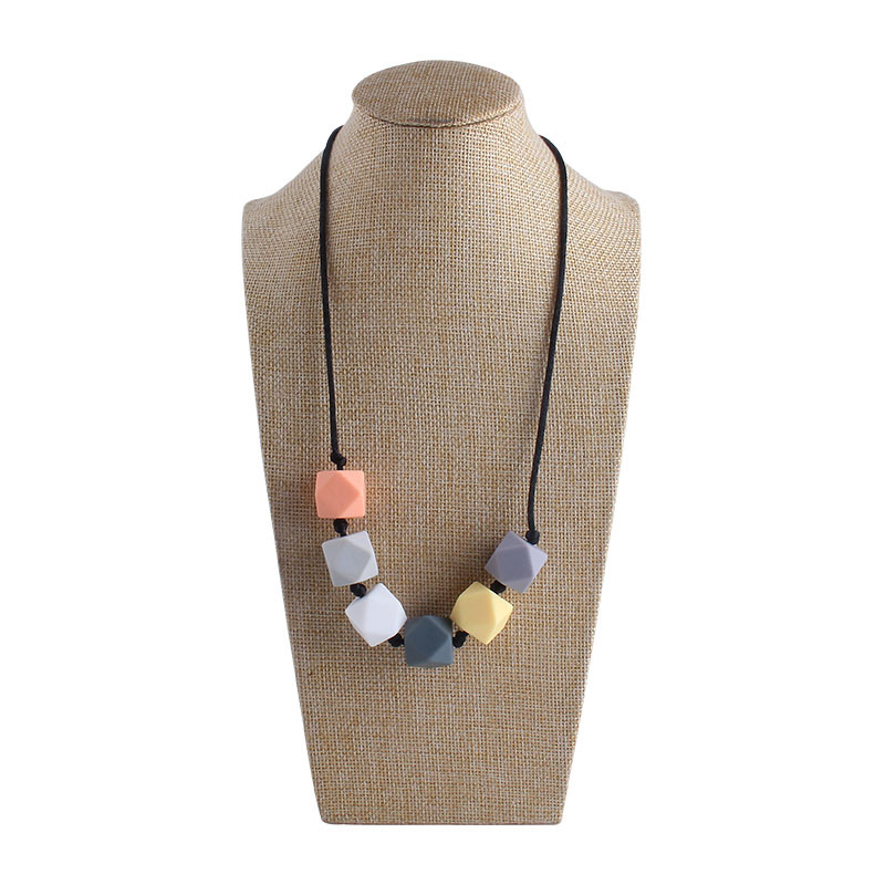 Comercio exterior Amazon collar nuevo bebé molar silicona octogonal mordedor collar masticable colgante mordedor palo