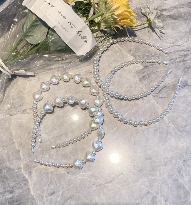 Korean Fashion Pearl Headband Simple Bride Flower Peach Heart Headband New Girl Fashion Wild Thin Edge Headband Headdress display picture 9