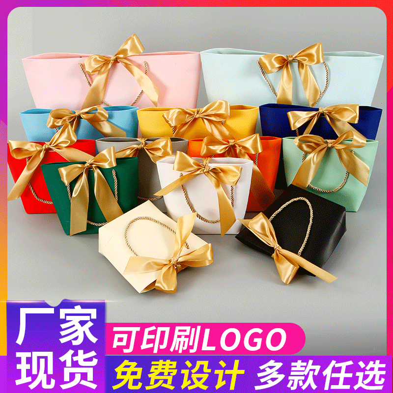 现货烫金蝴蝶结元宝袋 白卡纸手提袋 圣诞礼品服装购物纸袋可定制