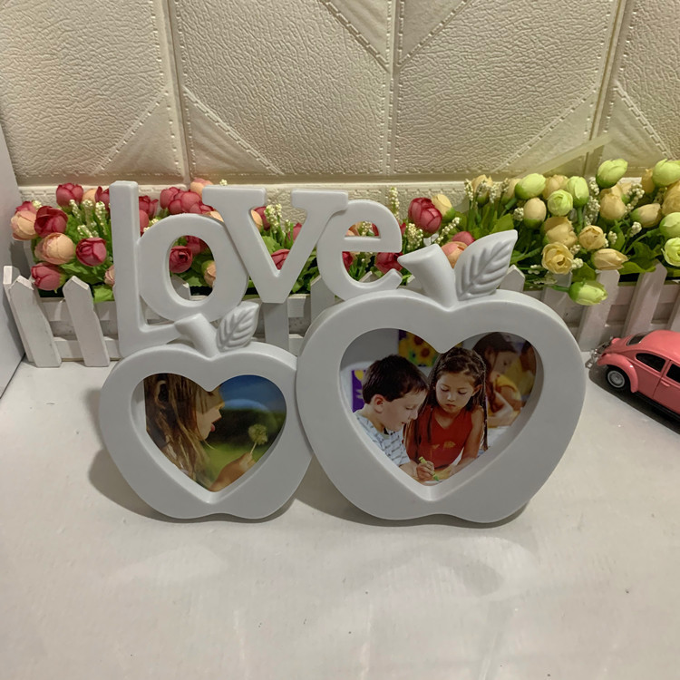 Pinhan plastic photo frame Apple love one-piece wall-mounted creative table photo frame Korean studio decoration Pinhan plastic photo frame Apple love one-piece wall-mounted creative table photo frame Korean studio decoration
