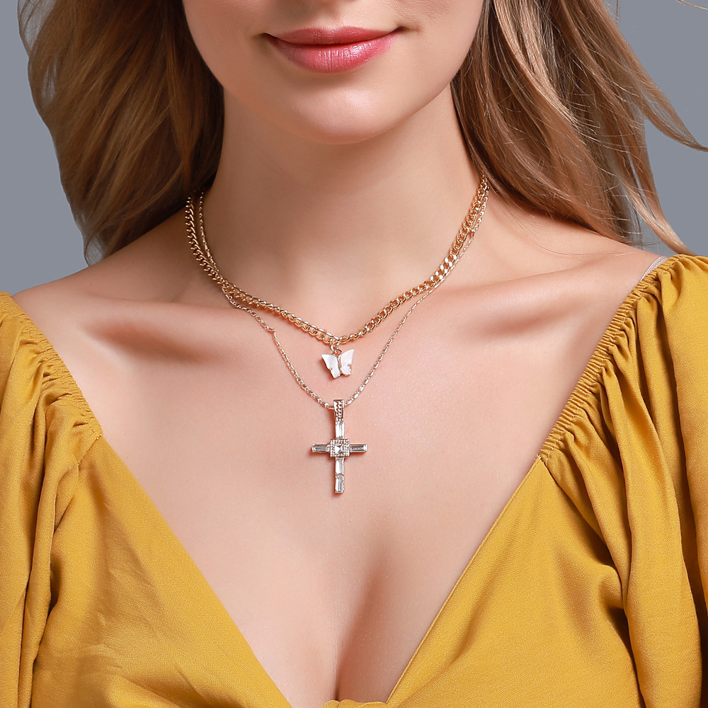 New Long Necklace Creative Small Butterfly Cross Letter Pendant Multi-layer Sweater Chain Wholesale Nihaojewelry display picture 3