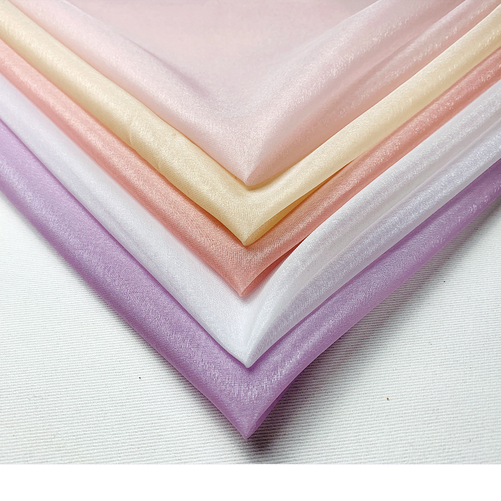 2023新款欧根纱20D锦涤交织 亮丝格纹硬挺成型轻薄时装面料批发