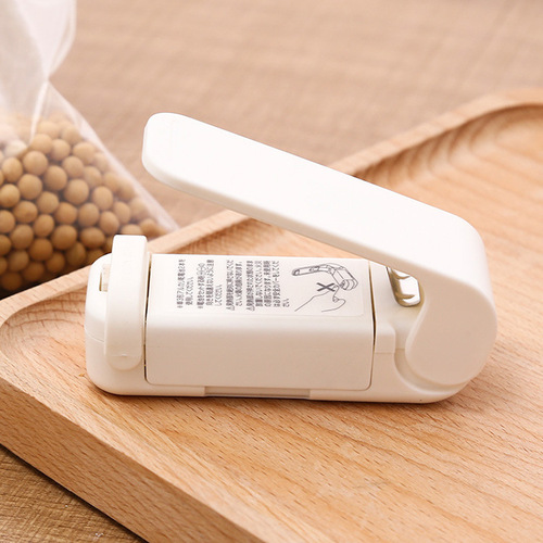 Japanese mini portable sealing machine small household plastic bag sealer snack hand pressure electric heat sealer
