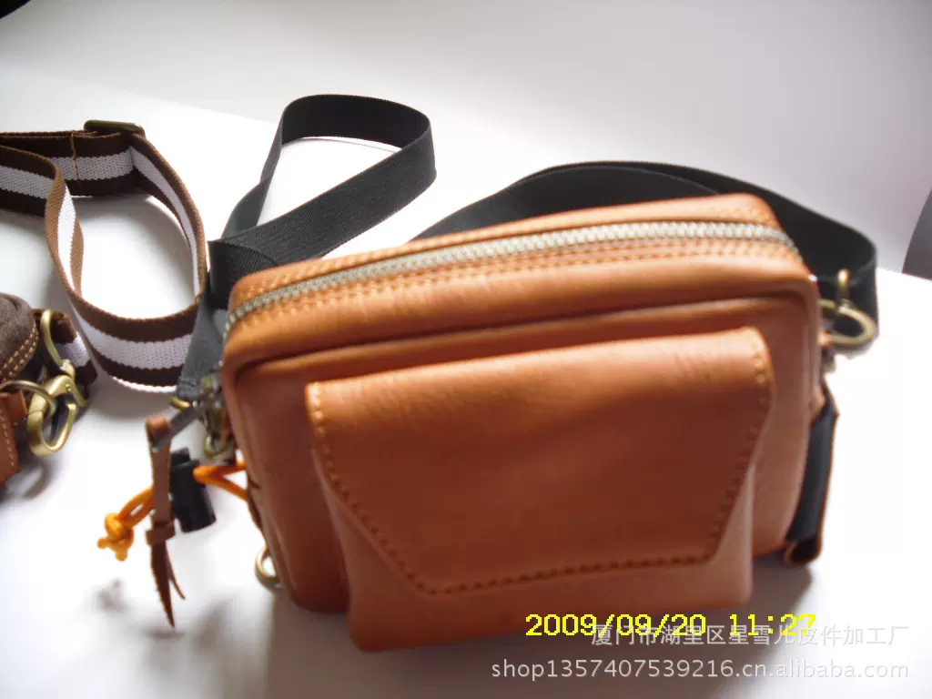 星雪儿新款休闲男男士斜挎包男式斜挎包纯色真皮车缝线男包