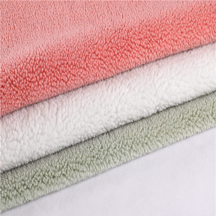 供应服装服饰复合面料羊羔绒针织布麂皮皮毛一体保温弹力布