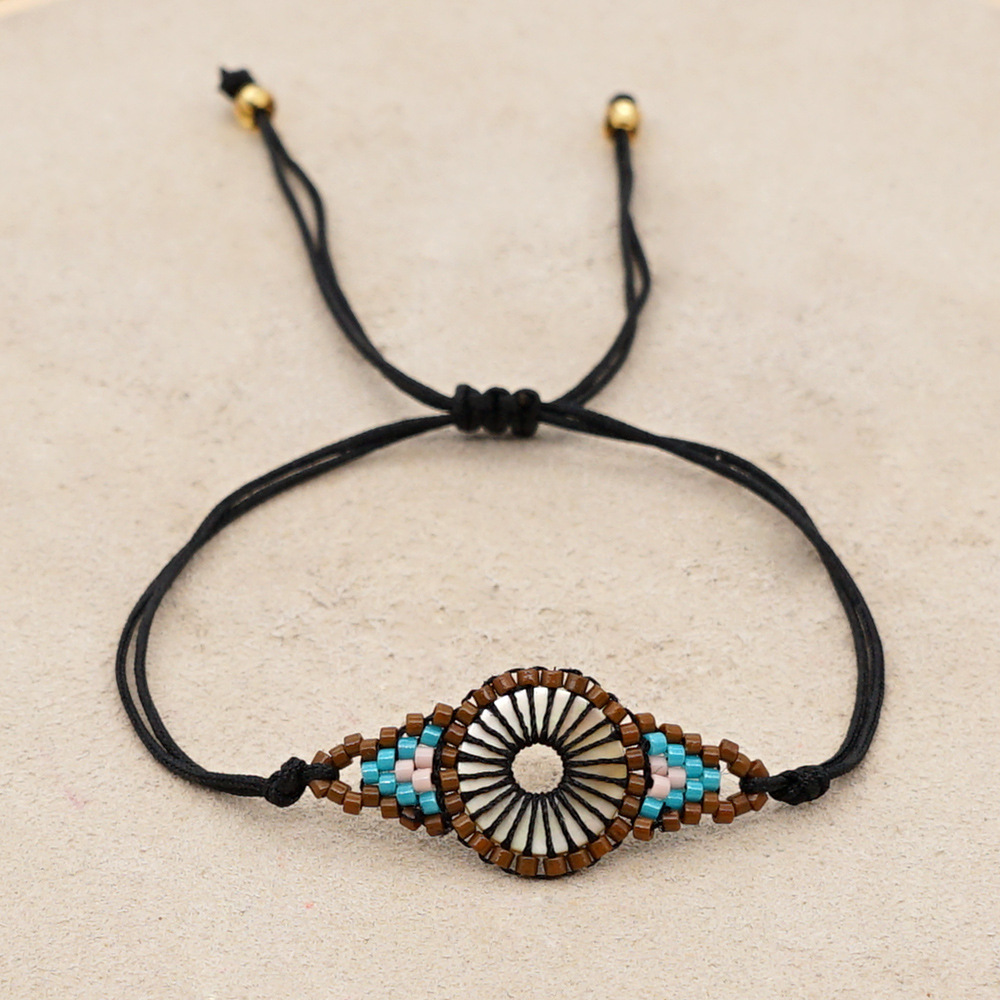 Fashion Geometric Bohemian Style Handmade Jewelry Rice Bead Braided Bracelet display picture 3