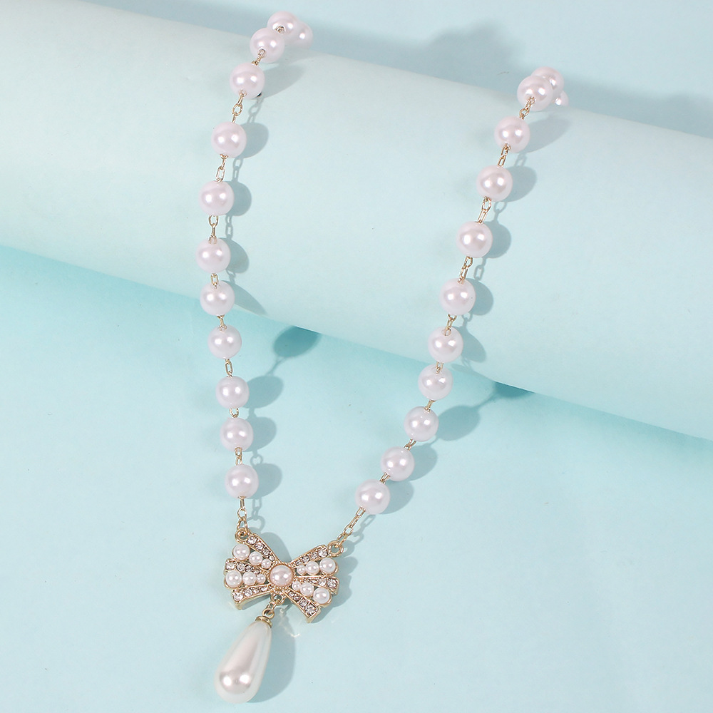 Hot-selling  Palace Luxury Pearl Diamond Earrings Bracelet Necklace Set Wholesale display picture 7