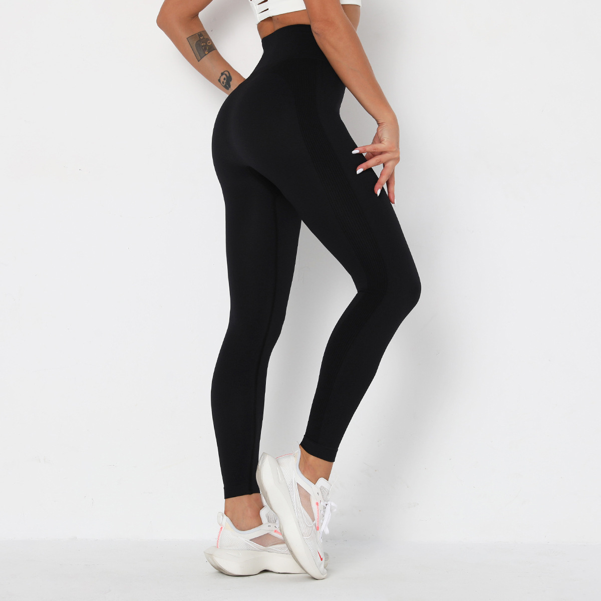 Pantalones de fitness ajustados de cintura alta de punto sin costuras NSLX9024