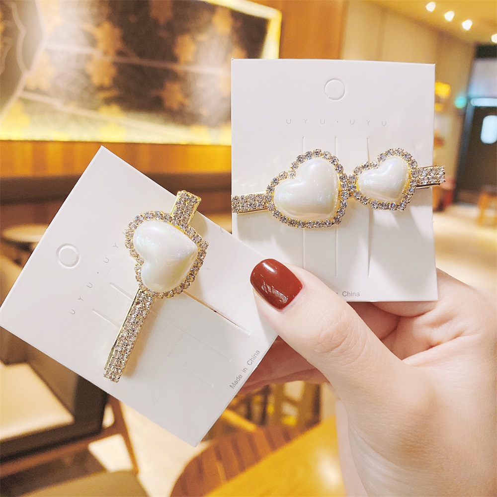 Korea Hair Accessories Imitation Pearl Heart Hairpin Simple Rhinestone Duckbill Clip display picture 1