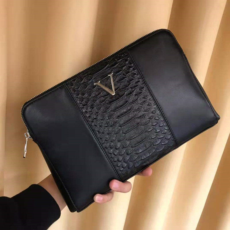 Factory wholesale 2020 winter new pattern man Top layer leather leisure time clutch bag genuine leather Serpentine middle age Handbag