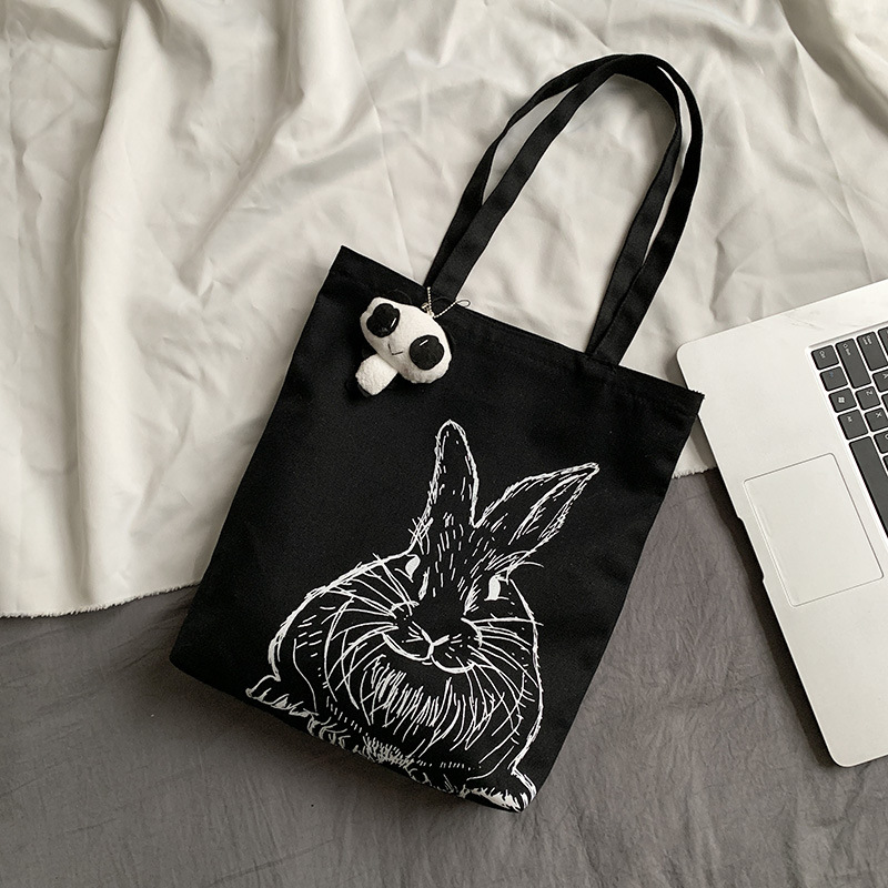 Bolsa de lona femenina estudiante de un solo hombro japonés ins bolsa de tela impresa de dibujos animados lindo de gran capacidad