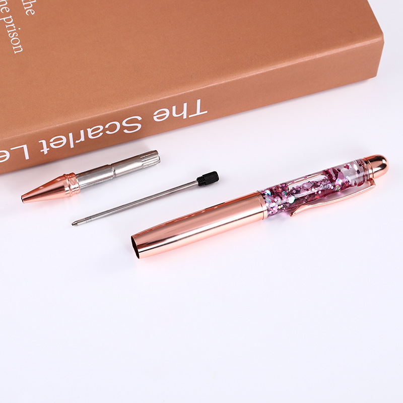 Suministro directo de fábrica pluma de cristal de aceite suspensión creativa bolígrafo Quicksand pluma metal regalo pluma publicidad pluma letras