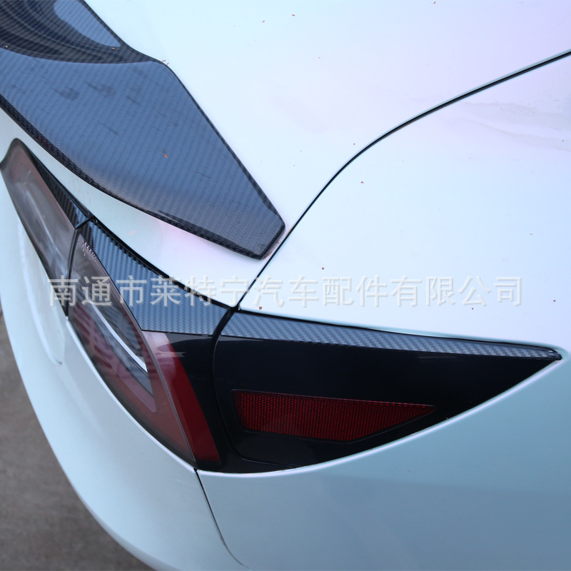 Aplicable a Tesla model3 Acero inoxidable trasero luz trasera ceja pegatinas decorativas accesorios de modificación