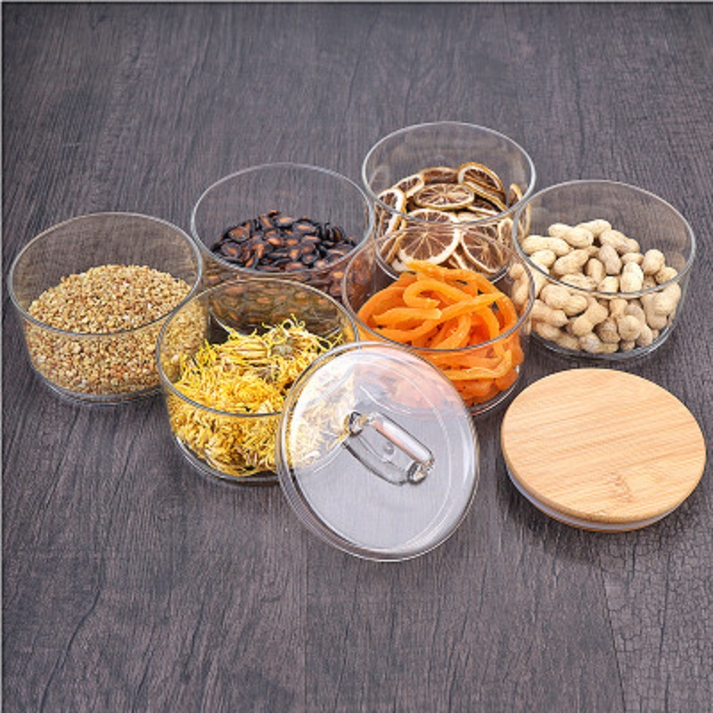Fábrica al por mayor de bambú cubierta de vidrio ensaladera borosilicato vidrio resistente al calor Sellado tarro de alimentos de grano