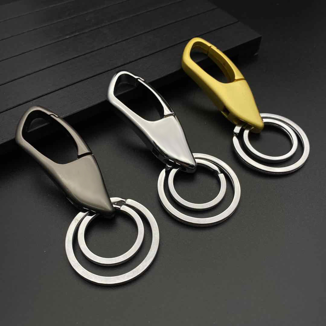 Los hombres de metal llavero coche personalidad creativa aleación llavero anillo personalizado publicidad logo pequeño regalo
