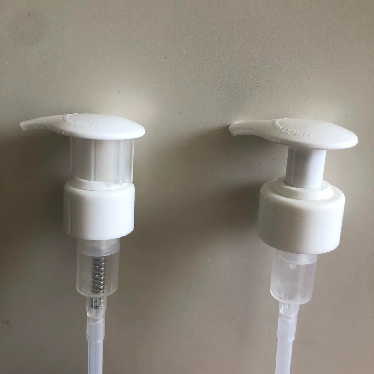 The new 28 outer spring switch pump PCR recycling plastic pressed duckbill pump