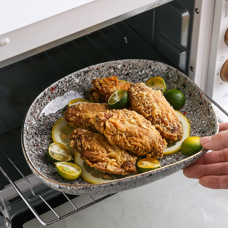Luz de lujo yuhua esmalte Vintage horno de cerámica vajilla horno de microondas borde dorado especial irregular tazón de arroz tazón de sopa plato occidental